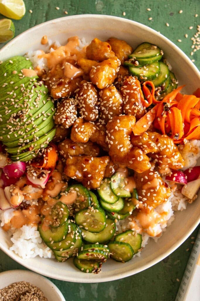 Assembled chicken banh mi bowl over rice
