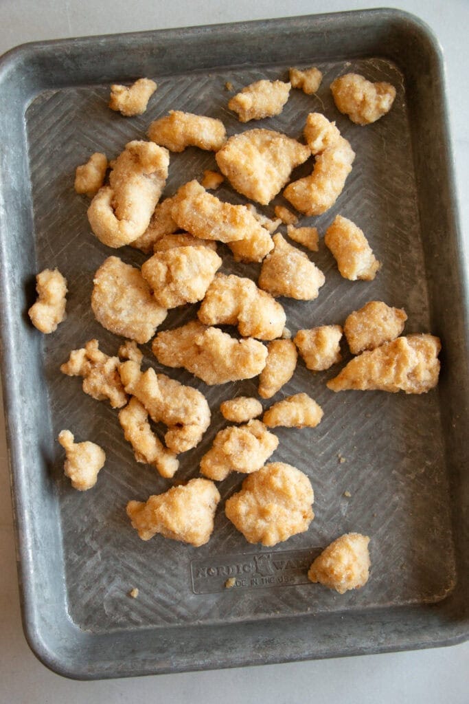 frozen tempura chicken on a pan