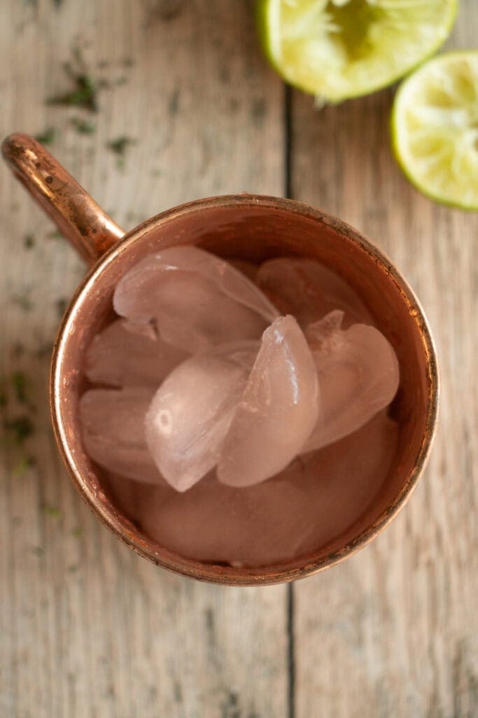Copper mug filled with ice
