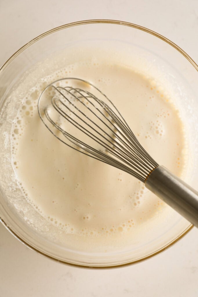 Mixing bowl with milk added into batter