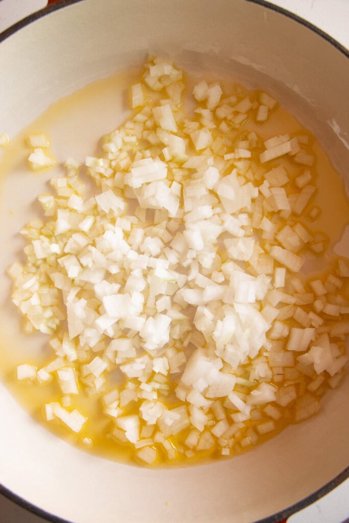 Onion sautéing in a pan