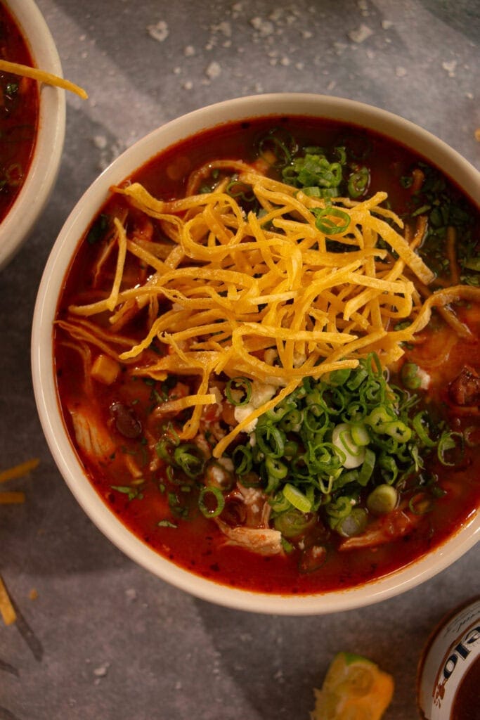 Large bowl of Panera chicken tortilla sop with crispy thin tortilla strips