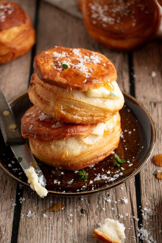 Air fried biscuits with a slather of butter, honey, and flaky salt 