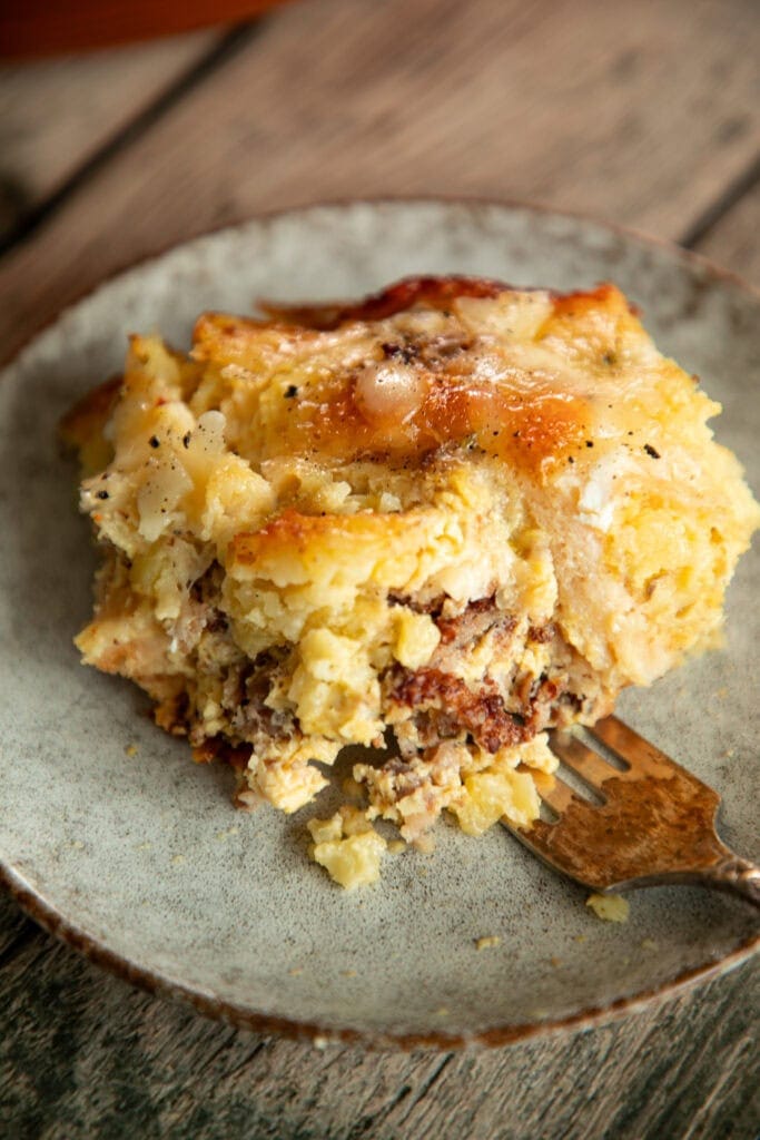 small plate with a scope of egg casserole