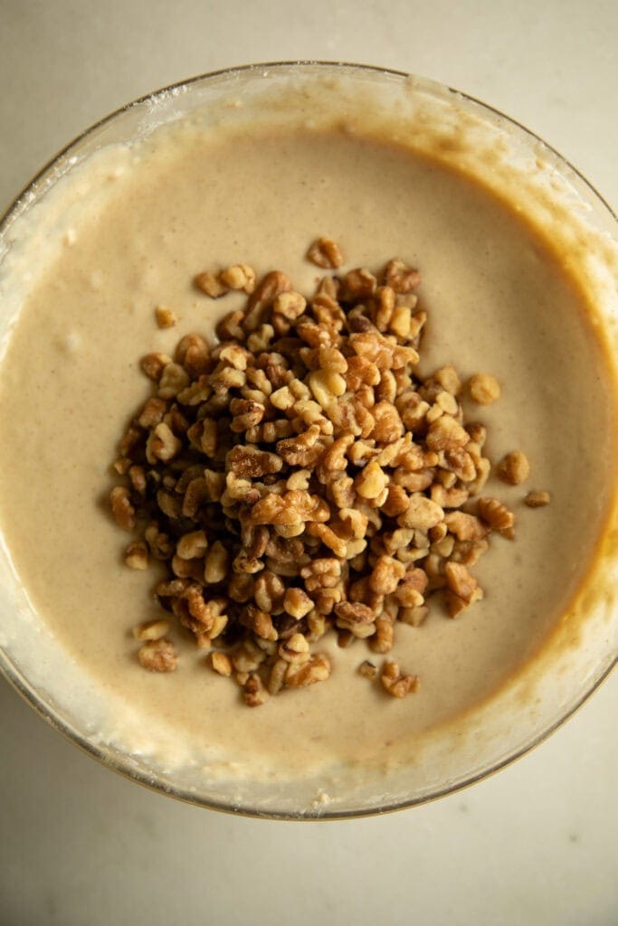 Mixing bowl with chopped walnuts 