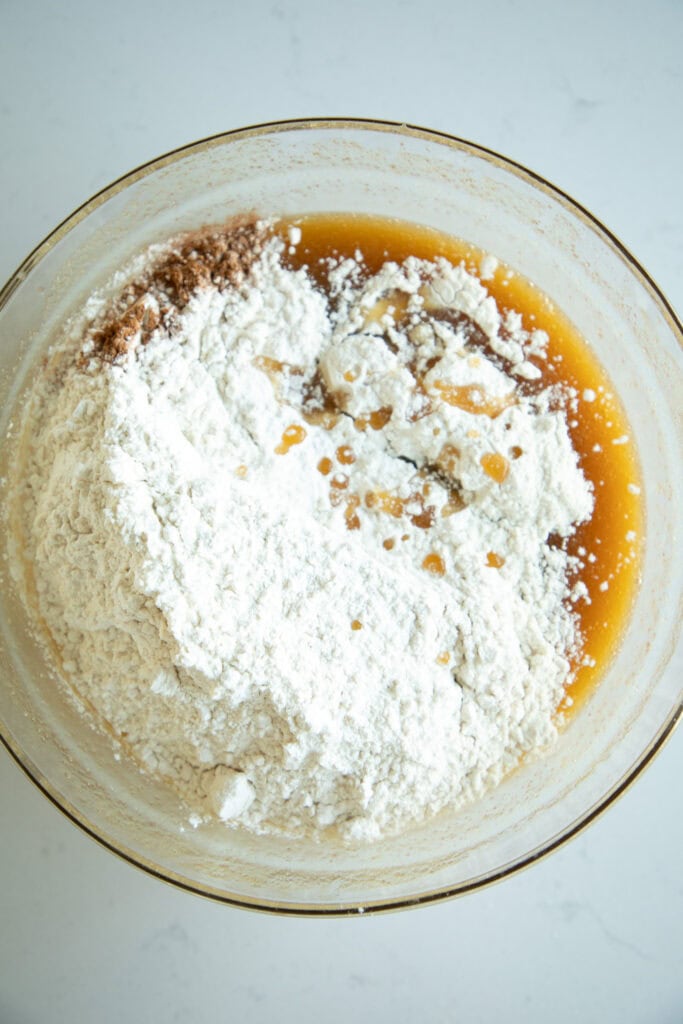 mixing bowl with batter and flour