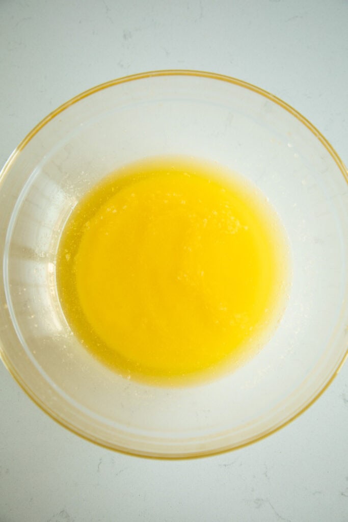 melted butter in mixing bowl