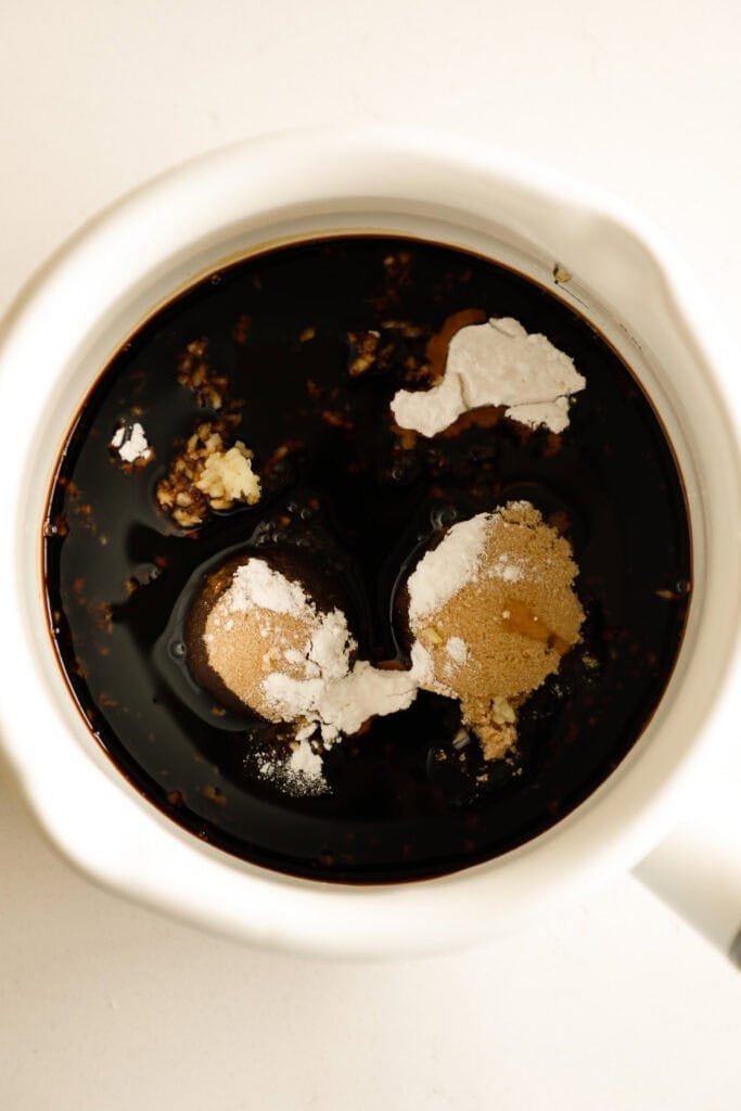 soy sauce in a sauce pan with teriyaki sauce ingredients