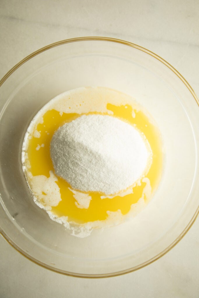 Mixing bowl with melted butter and sugar.