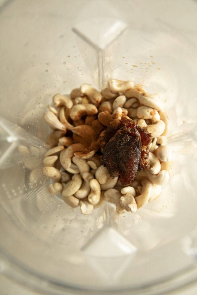 Blender with cashews, dates, and cinnamon