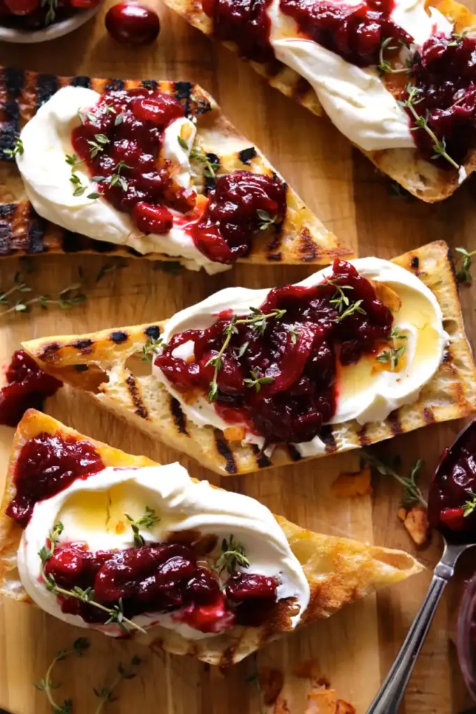 Crispy crostini with feta and cranberry jelly