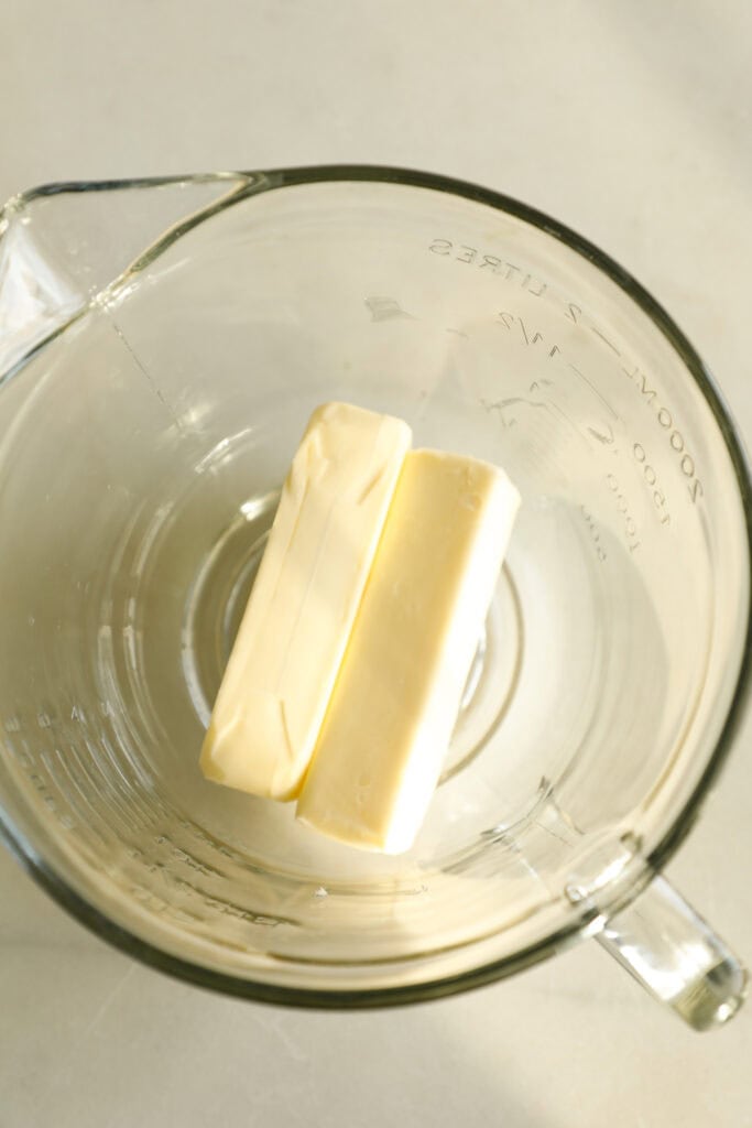 mixing bowl with sticks of butter