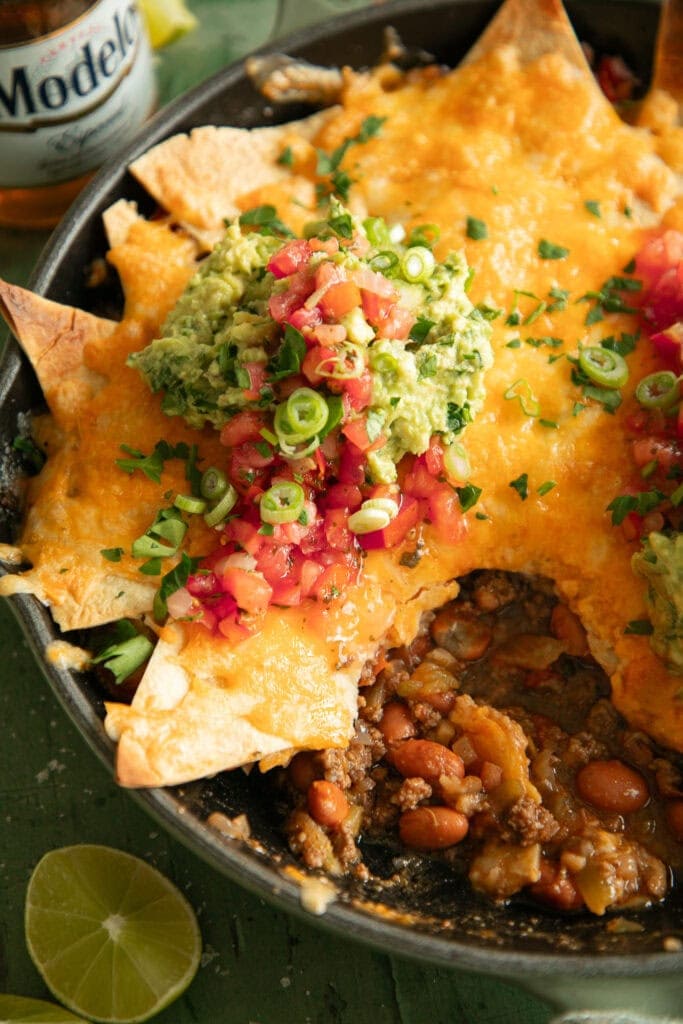 Large skillet with a baked taco casserole