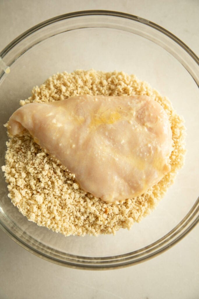 mixing bowl with panko and chicken cutlet 