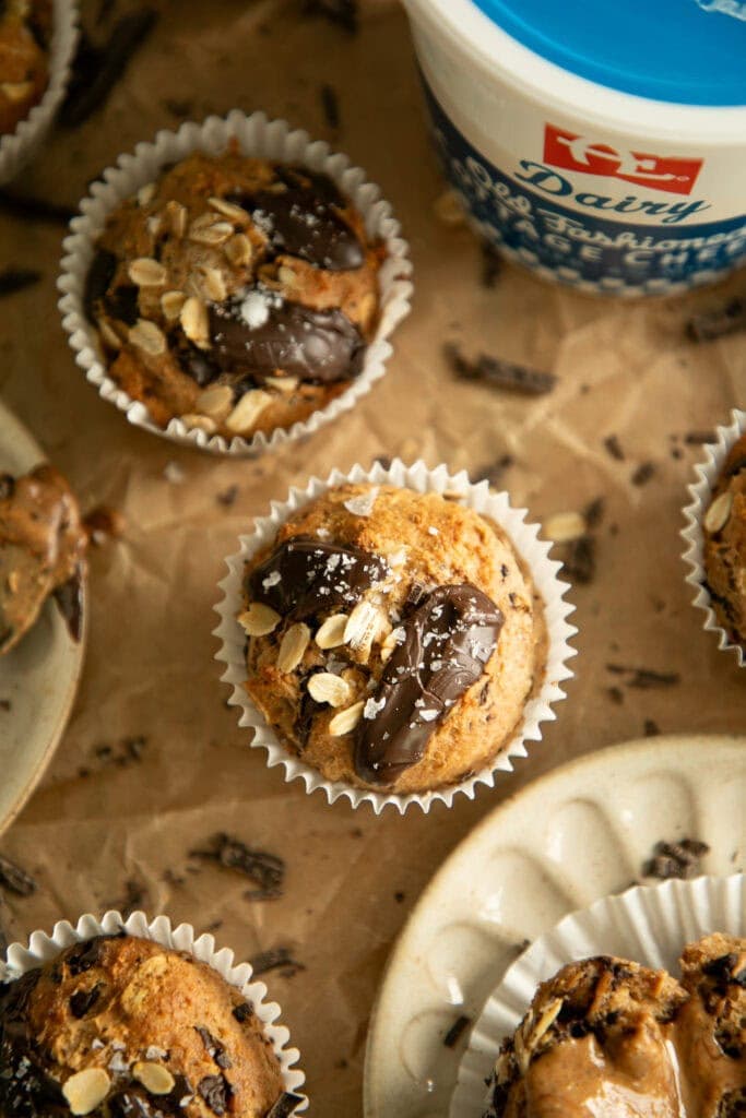 Banana oat cottage cheese muffins on parchment paper