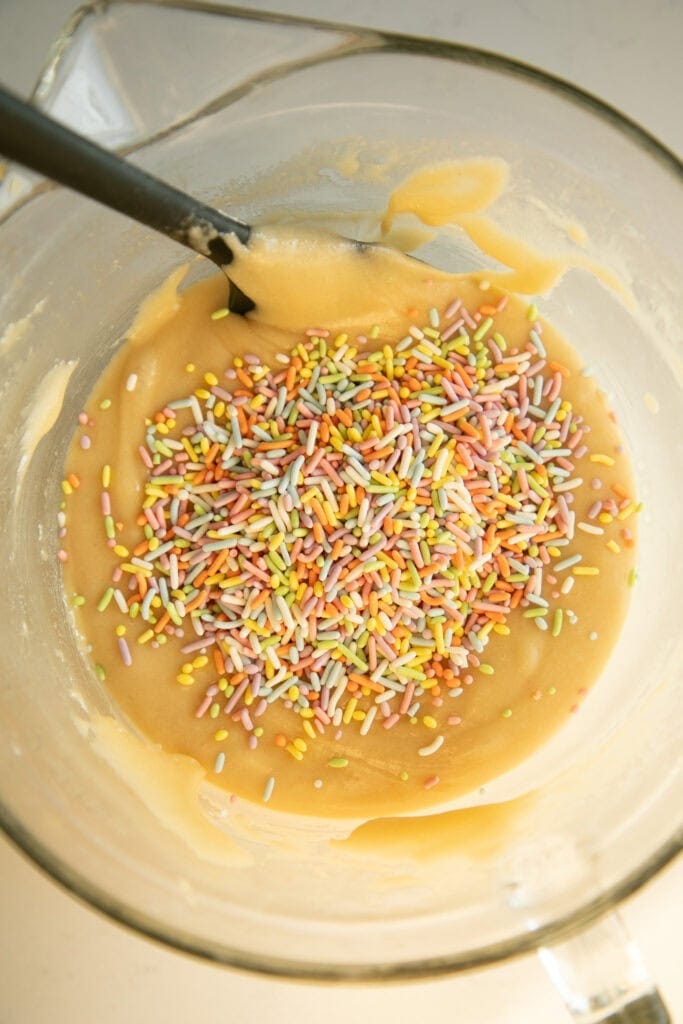 mixing bowl with cookie dough and sprinkles