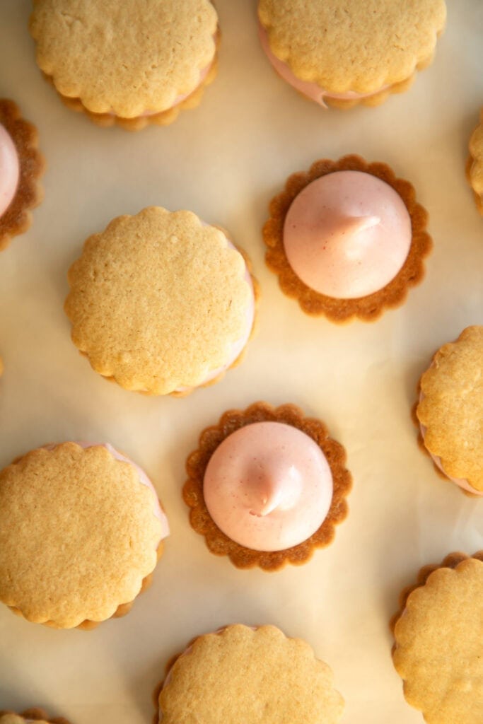 shortbread cookies with a dollop of pink frosting