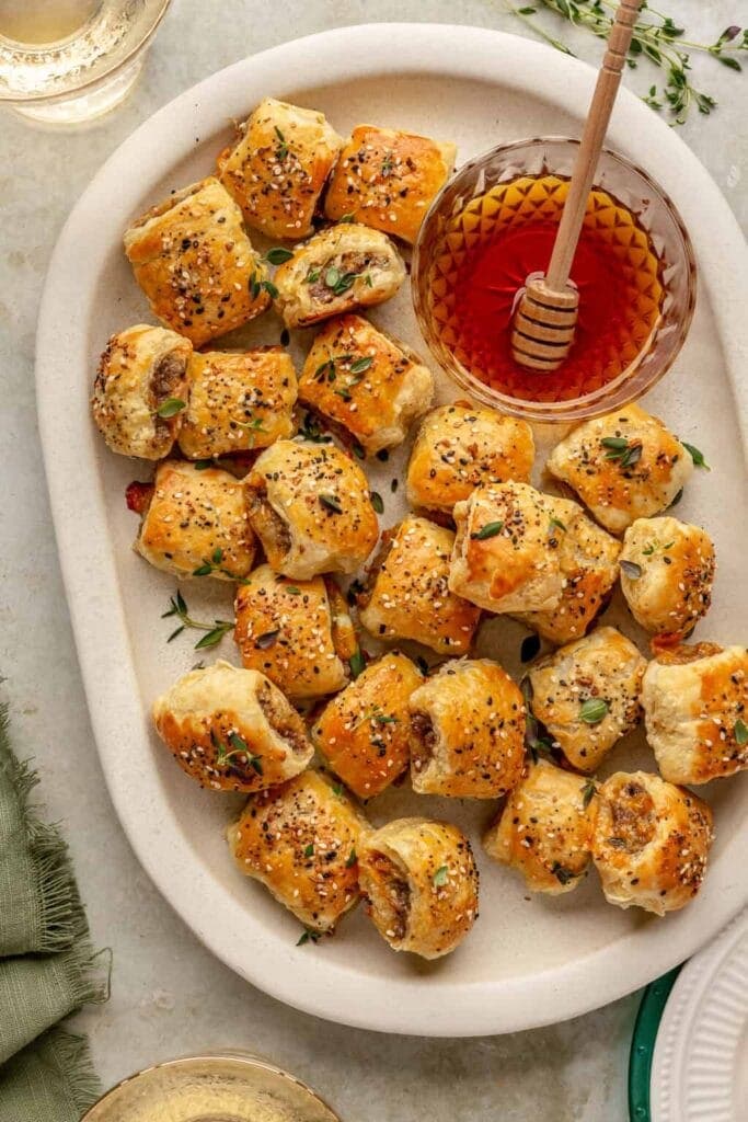 Crispy sausage rolls on a platter