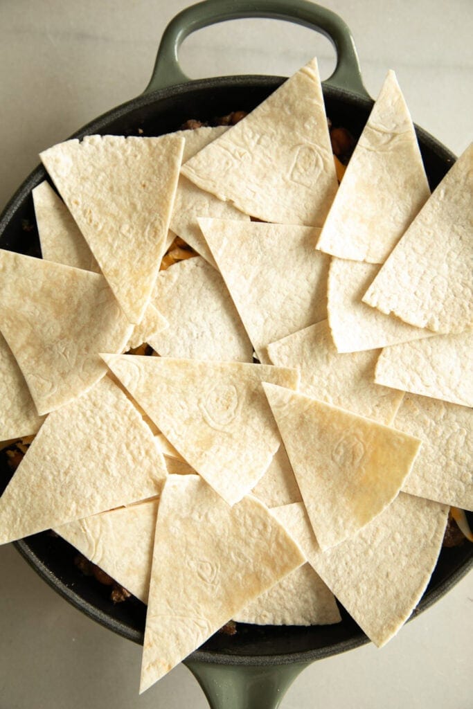sliced tortillas on top of the beef casserole