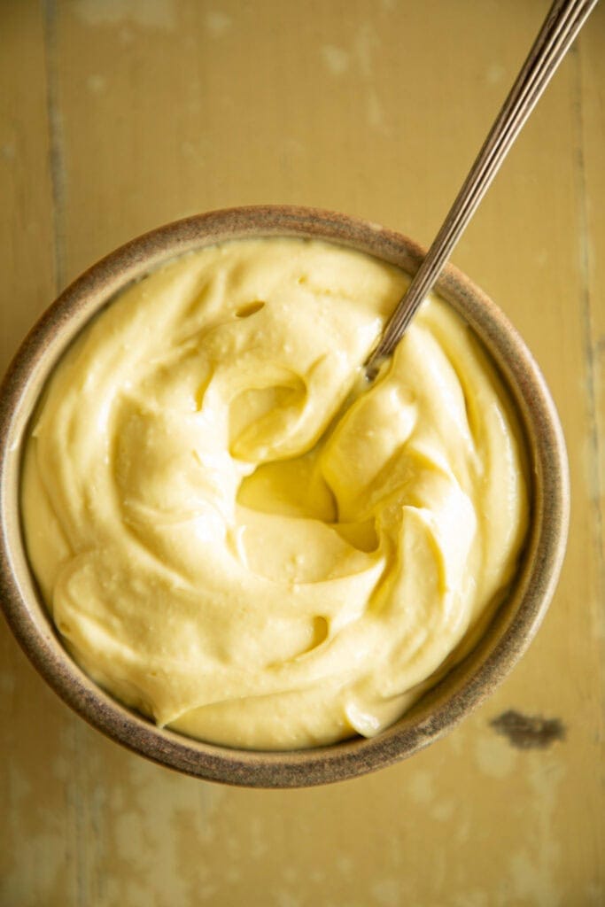 bowl of homemade mayo with a spoon
