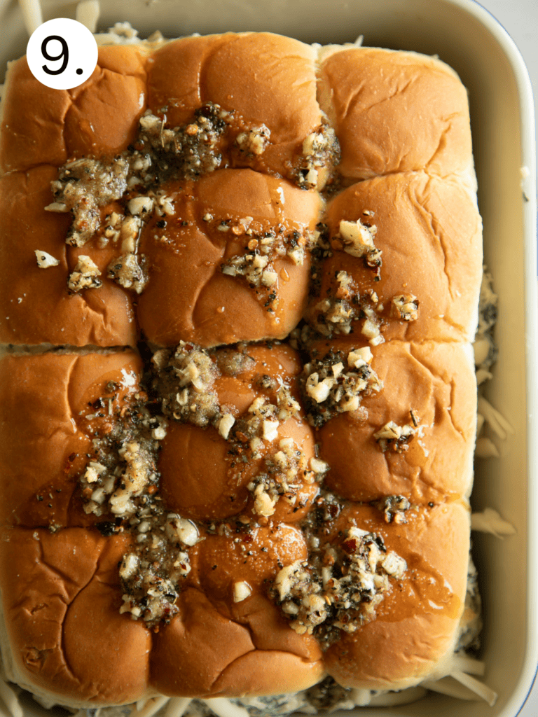 unbaked sliders topped with garlic butter
