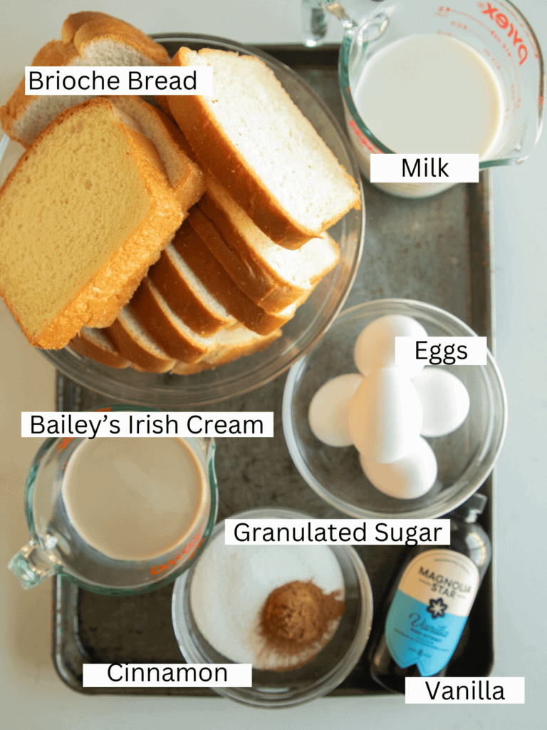 Portioned and labeled ingredients on a sheet pan