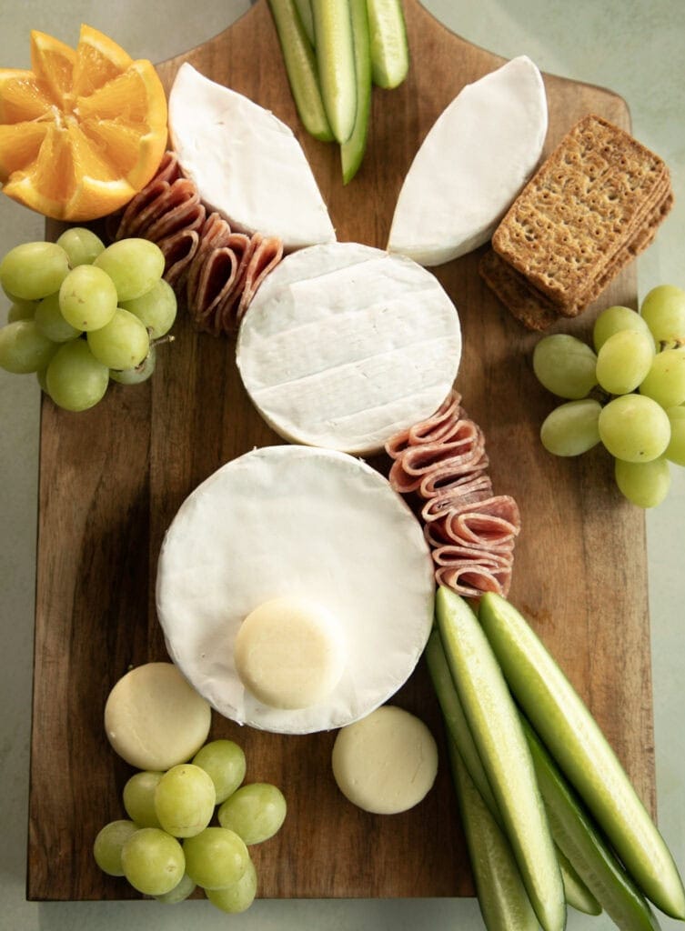 The start of an Easter charcuterie board with a cheese bunny