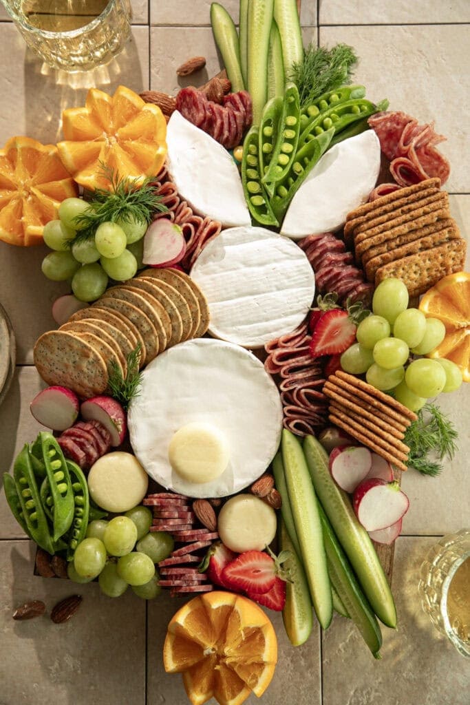 large charcuterie board with a cheese bunny