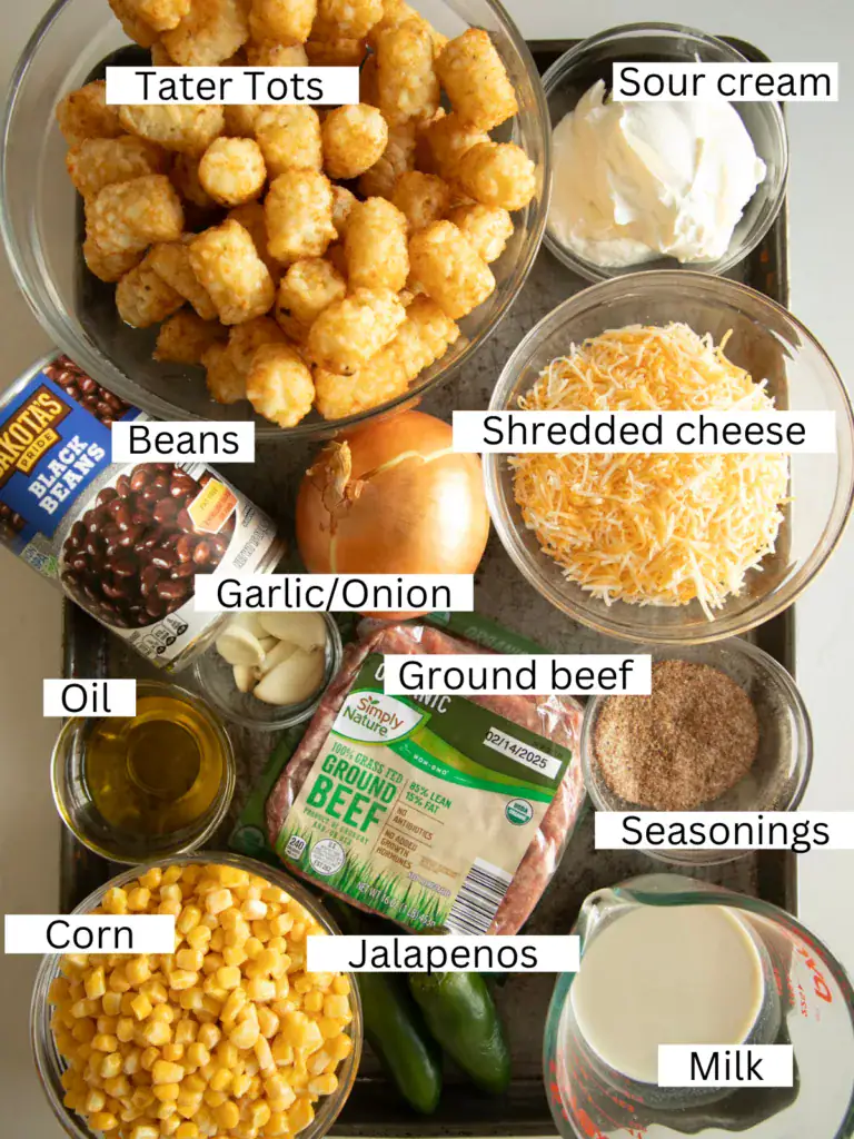 Sheet pan with portioned and prepped ingredients labeled by name