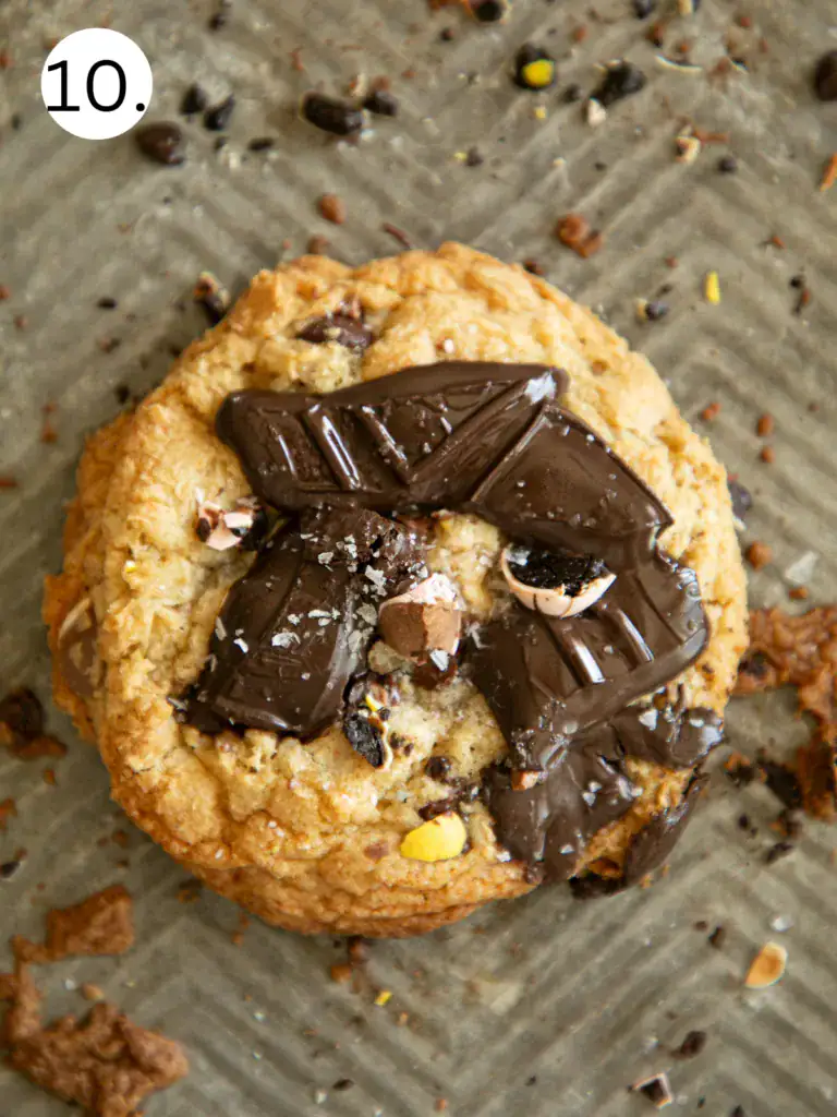 gooey fresh baked cookie on a sheet pan