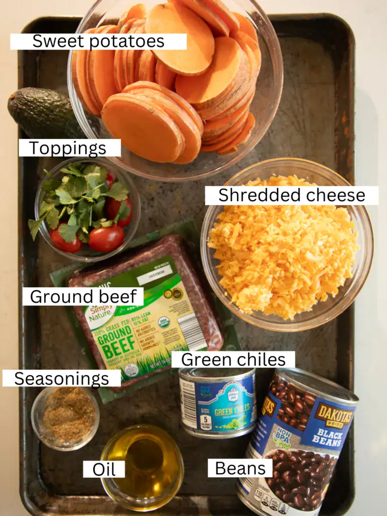 Prepped and portioned ingredients on a sheet pan with ingredient labels 