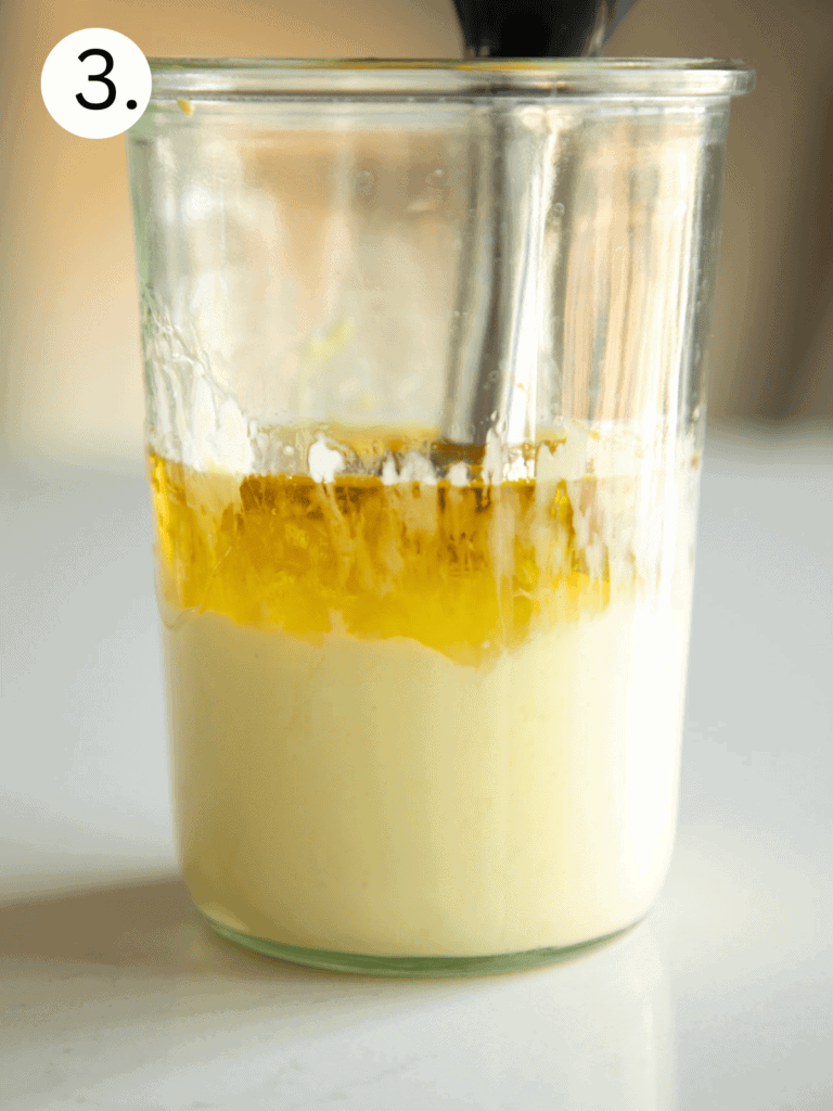 mayo base in a jar with remaining olive oil