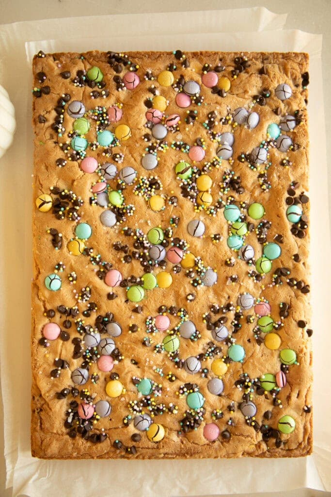 9x13 pan of baked cookie bars with Easter M&Ms