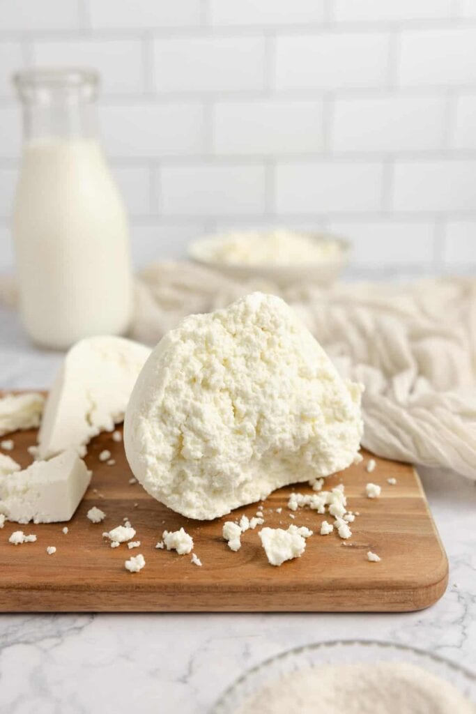 ball of farmers cheese on a board