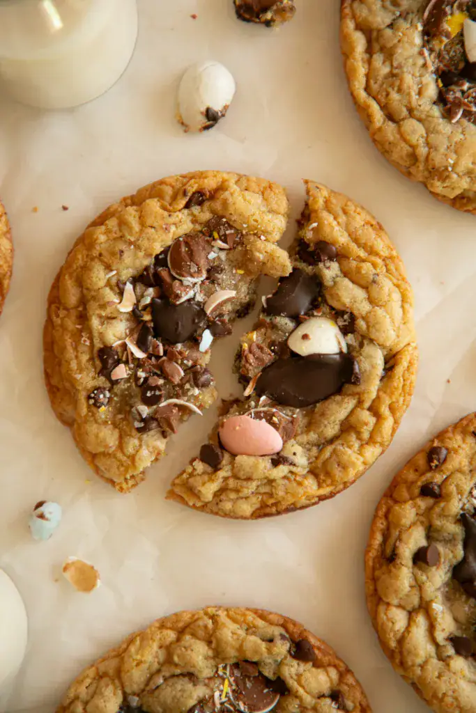 Chewy Easter cookie on parchment paper ripped in half