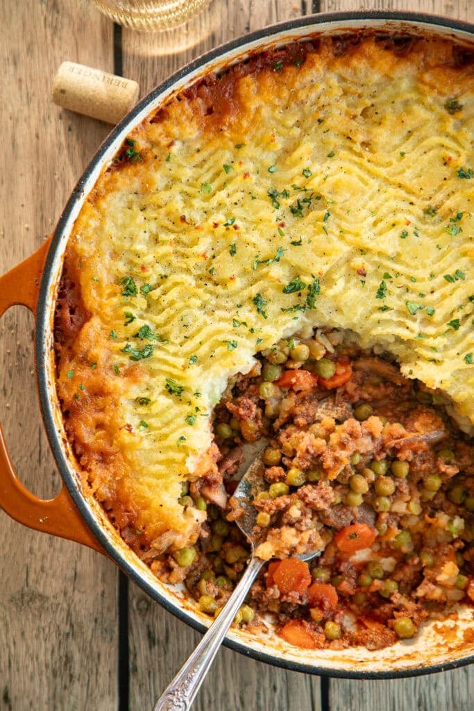 whole30 shepherd's pie in a pan with a scoop taken out