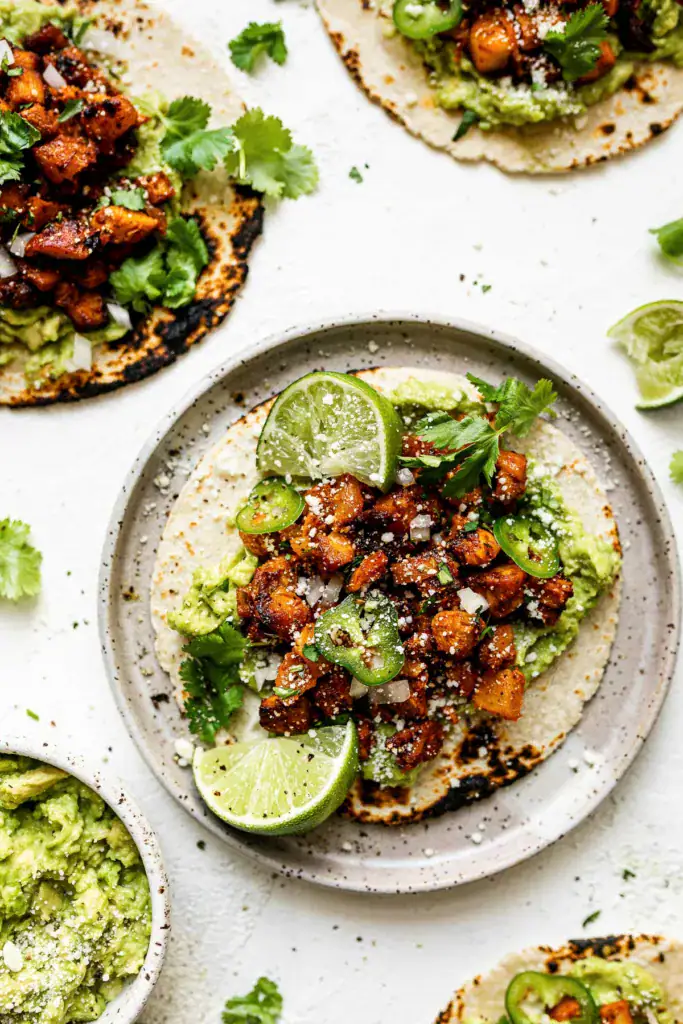tortillas topped with al pastor chicken
