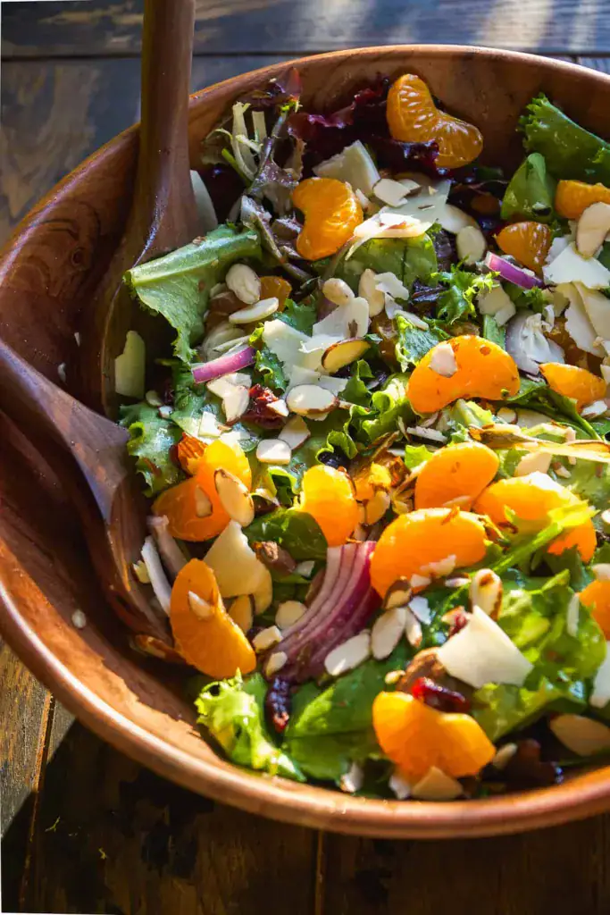 Wooden bowl full of mandarin orange salad