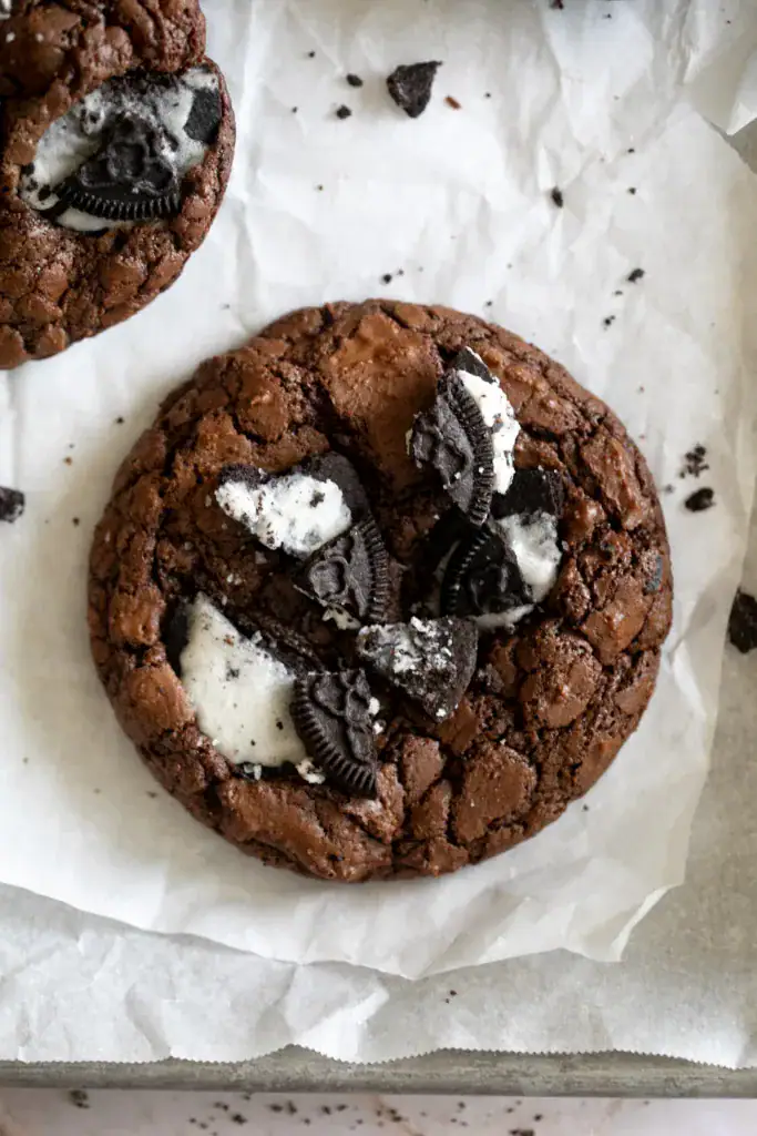 freshly baked Oreo brownie cookie on parchment paper