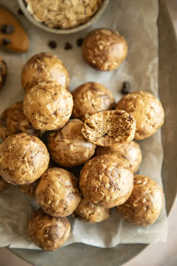 5 ingredients protein bites on a tray with parchment paper