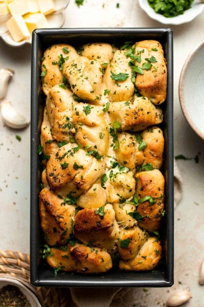 loaf pan with garlic rolls