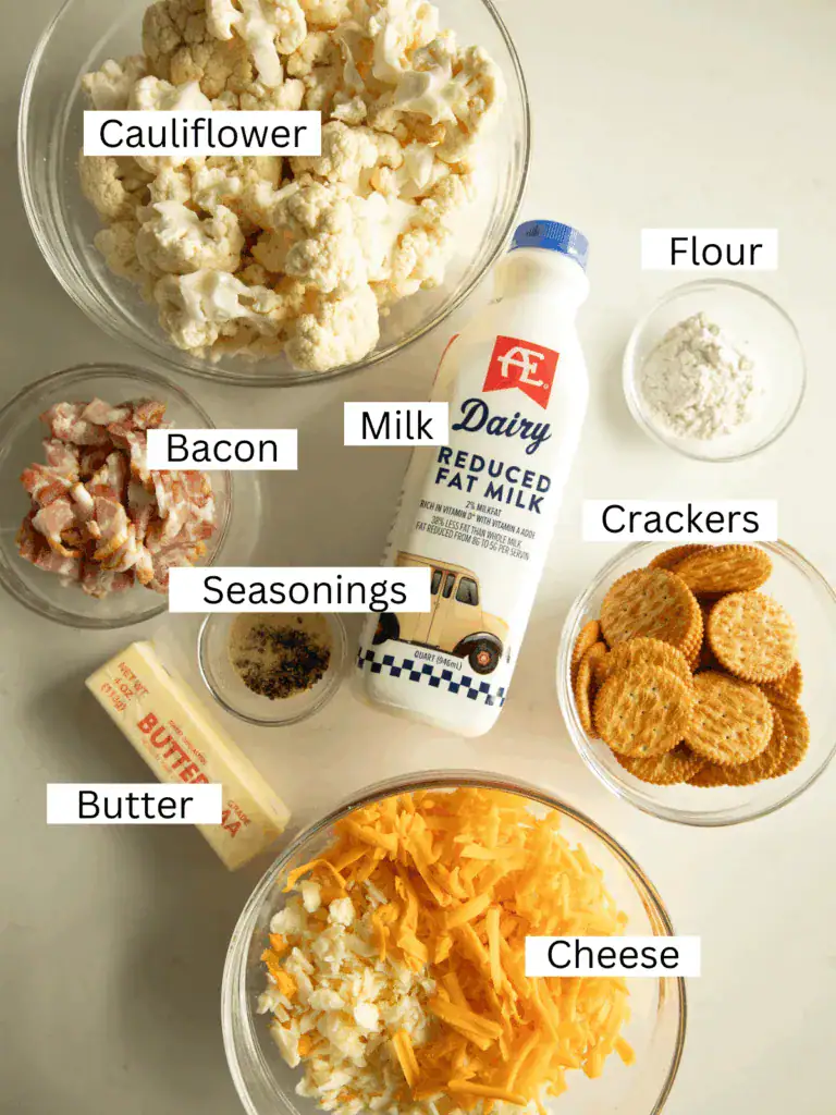 prepped and portion ingredients for the cauliflower casserole on a marble slab