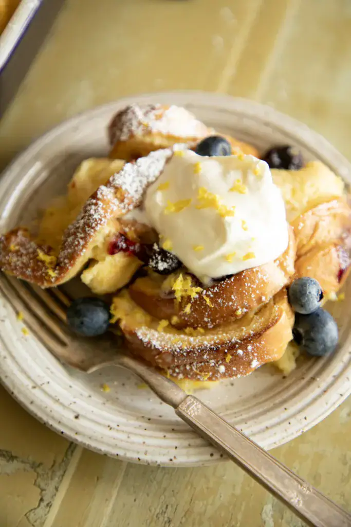 plate with a scoop of baked French toast