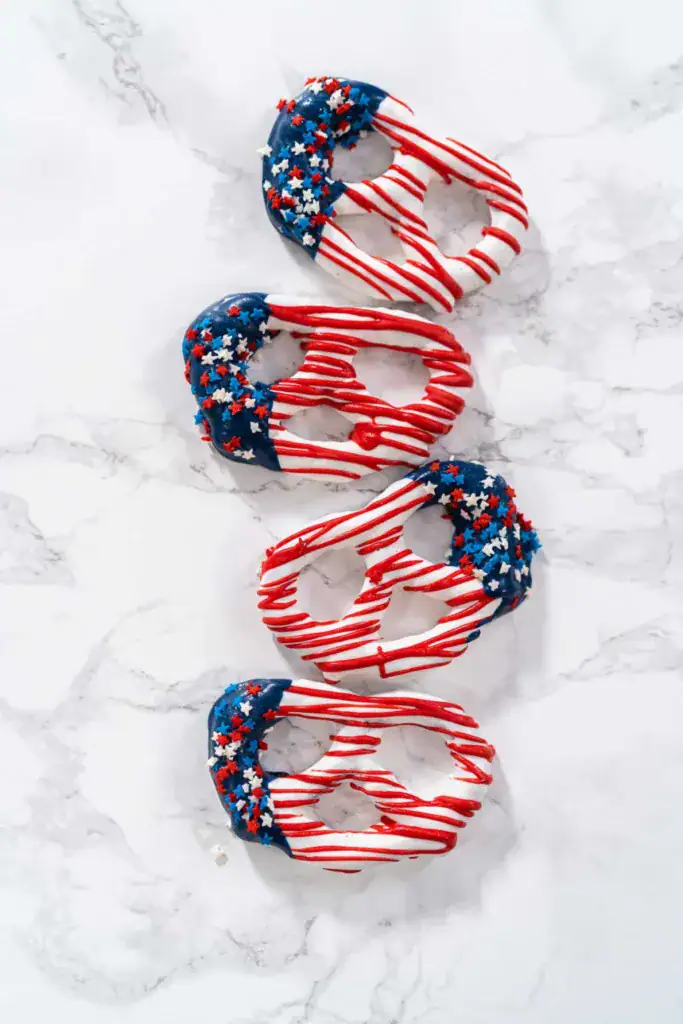 pretzels covered in chocolate with sprinkles