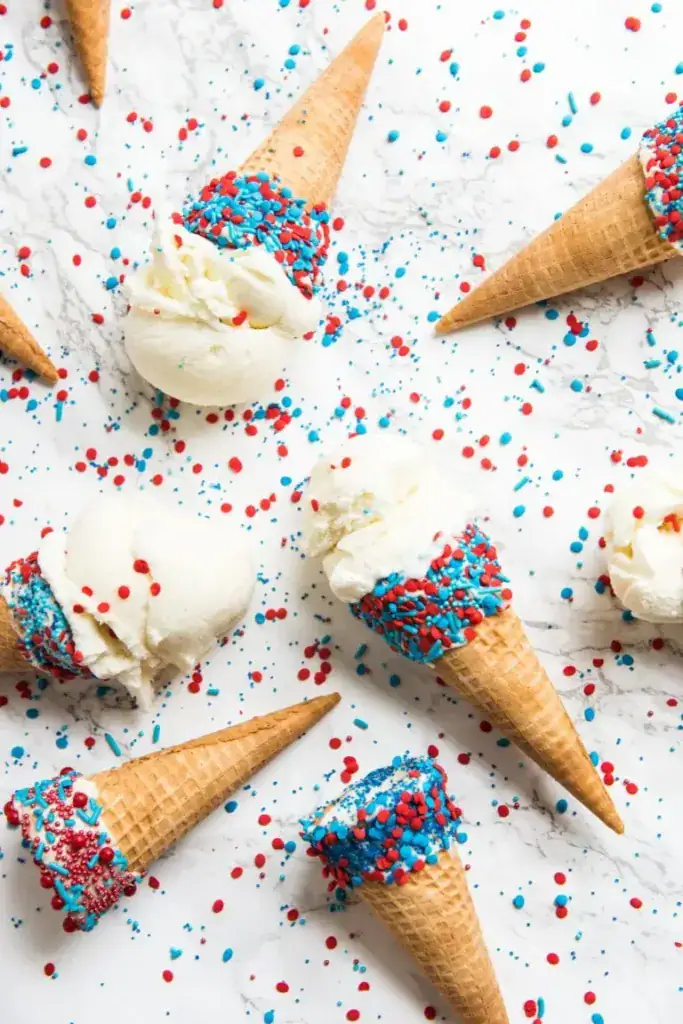 red and blue sprinkled on ice cream cones