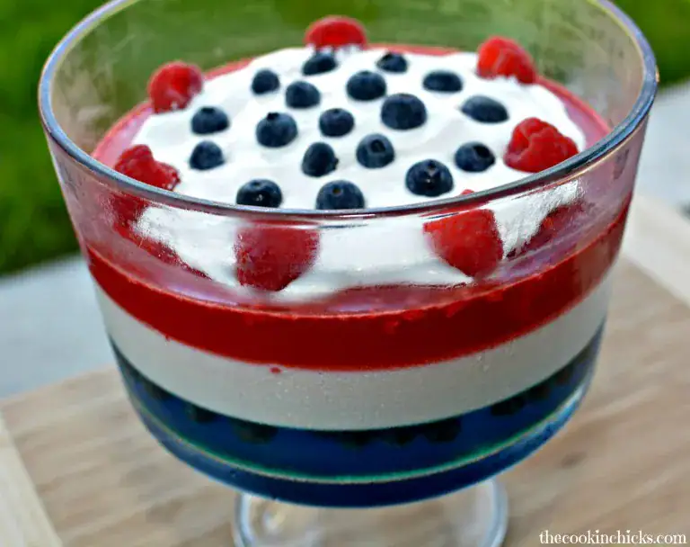 glass dish with layers of jello and berries