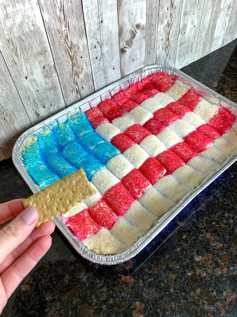 foil pan with gooey marshmallows and colored sugar