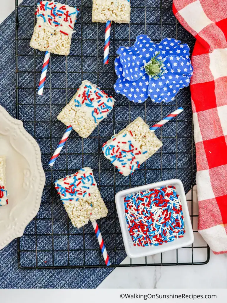 dipped rice krispie treats on paper sticks