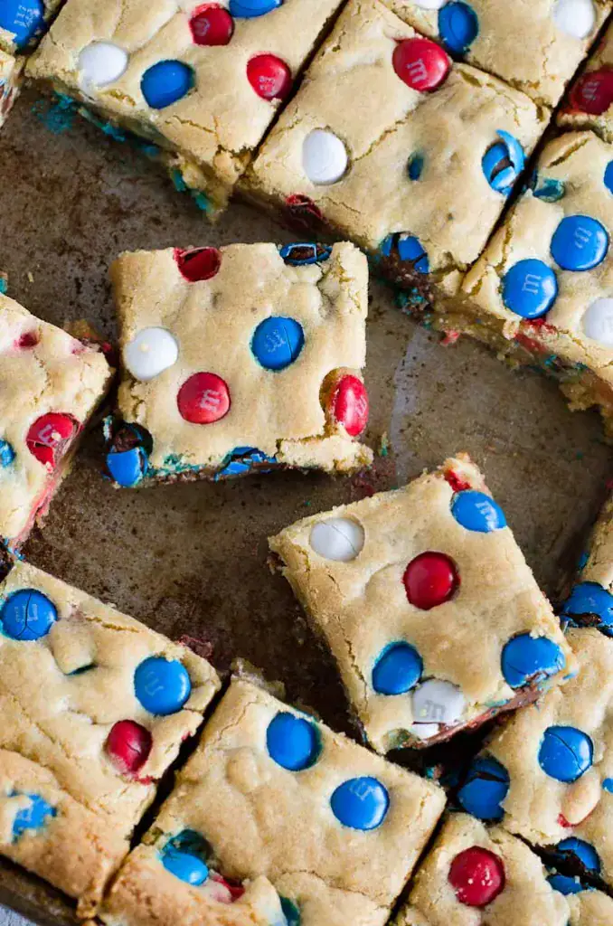 chewy cookie bars with festive m&ms