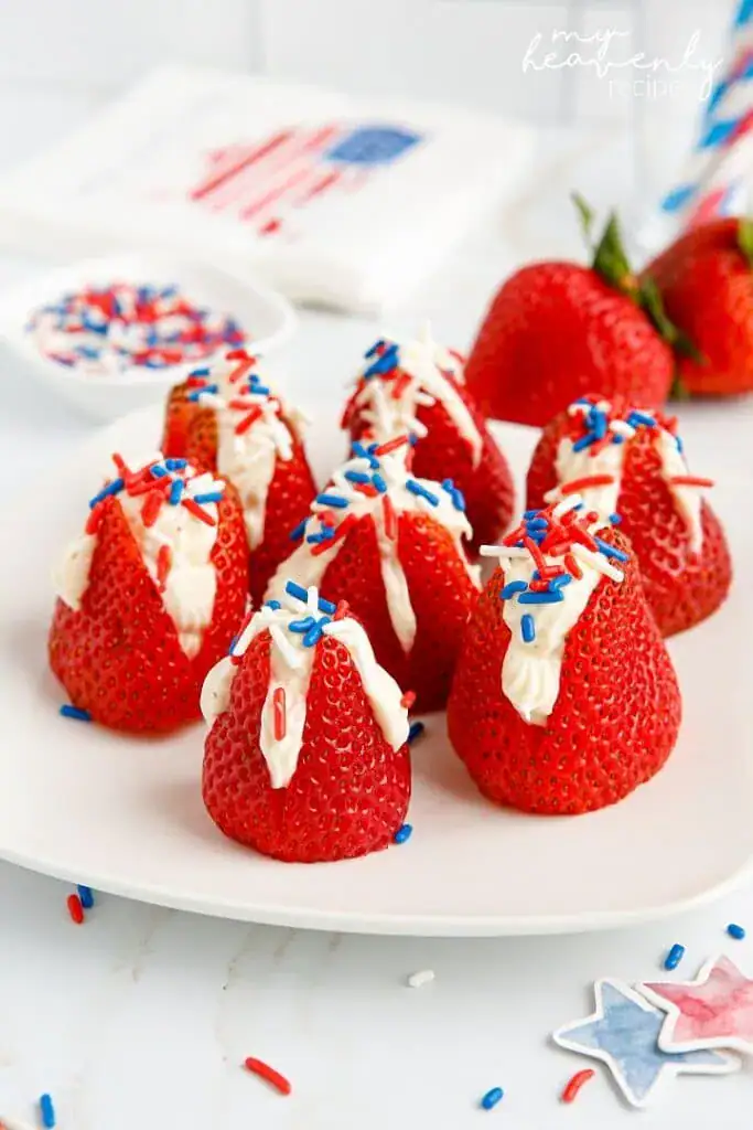 strawberries filled with a cream filling and sprinkles